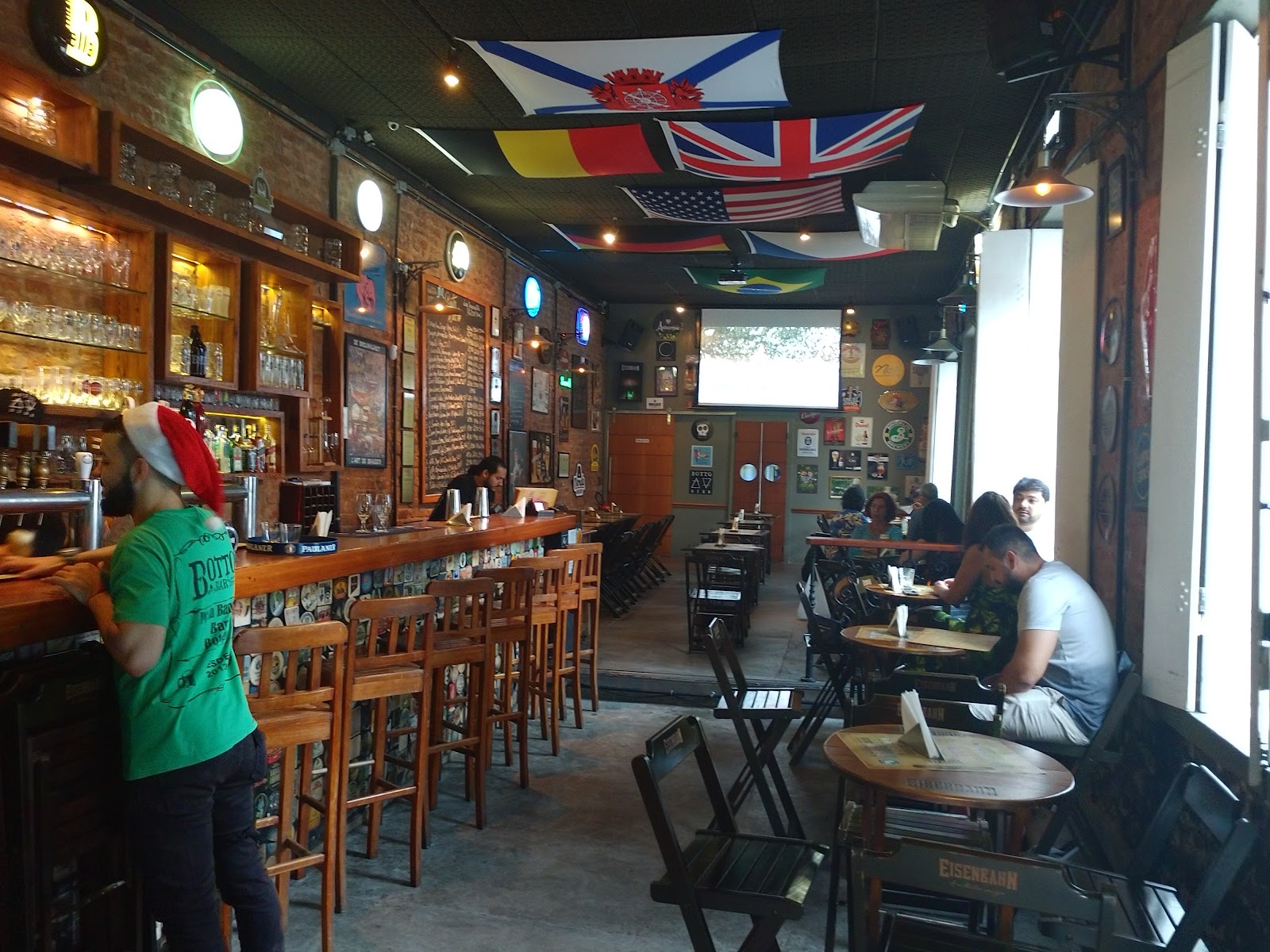 Row of craft beer taps at a Rio de Janeiro beer bar