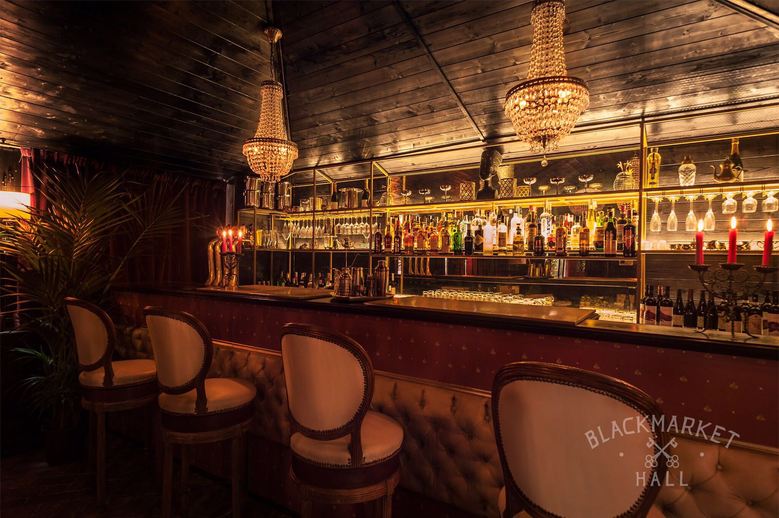 Lamp-lit lounge interior at Blackmarket Hall in Rome's Monti district