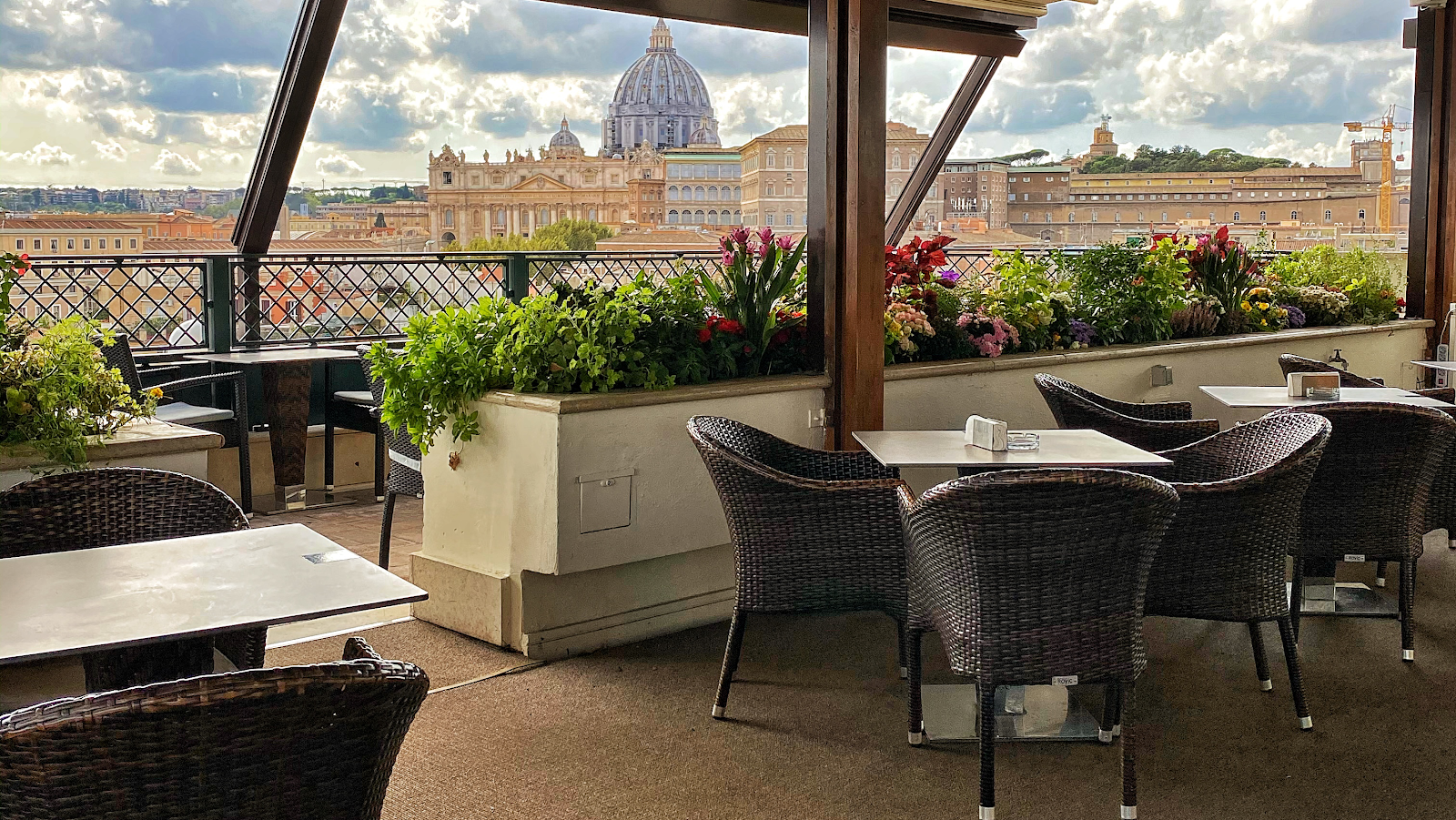 Terrazza Les Etoiles rooftop bar with St Peter's dome view, Prati Rome