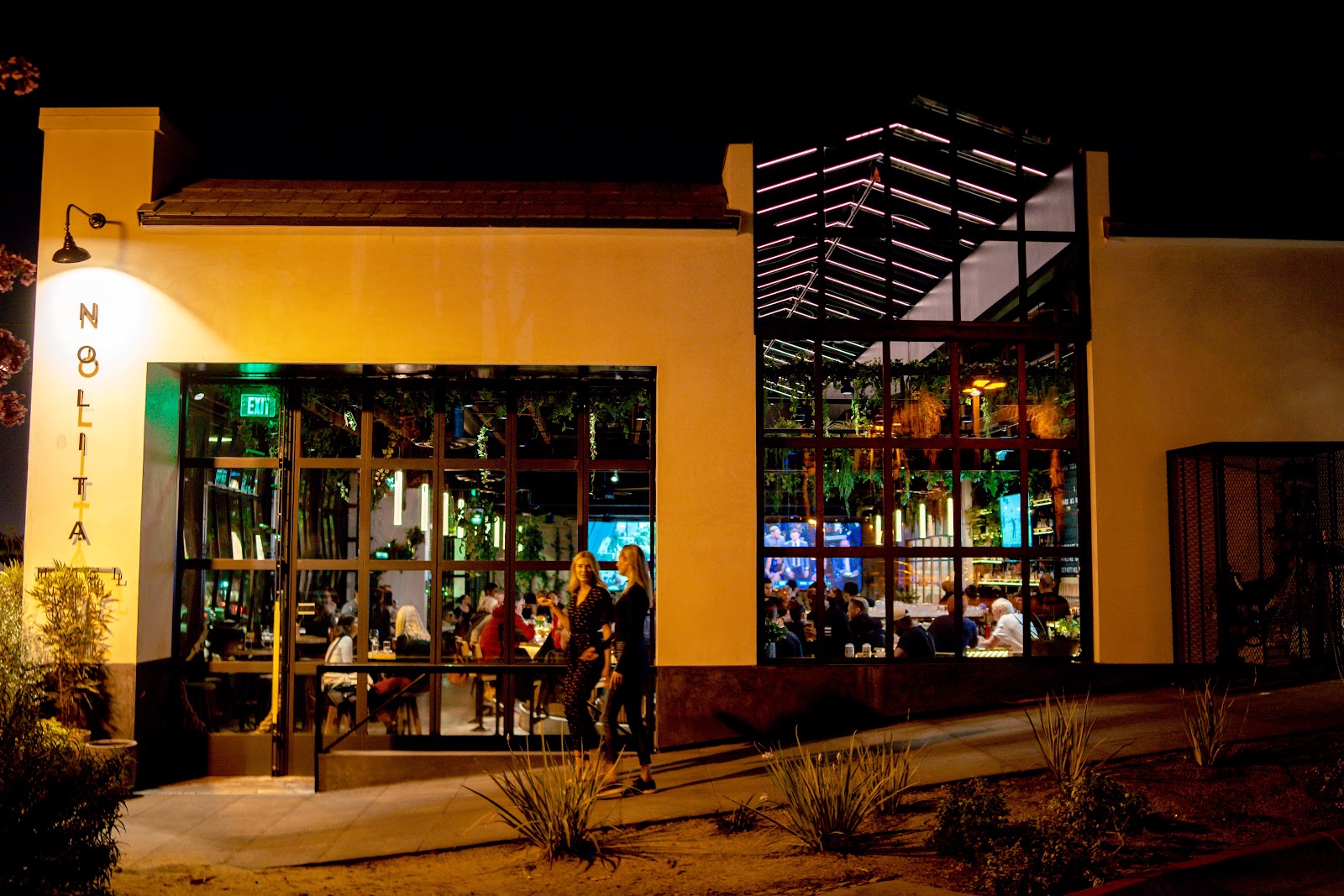 Cocktail and wood-fired pizza at Nolita Hall in San Diego