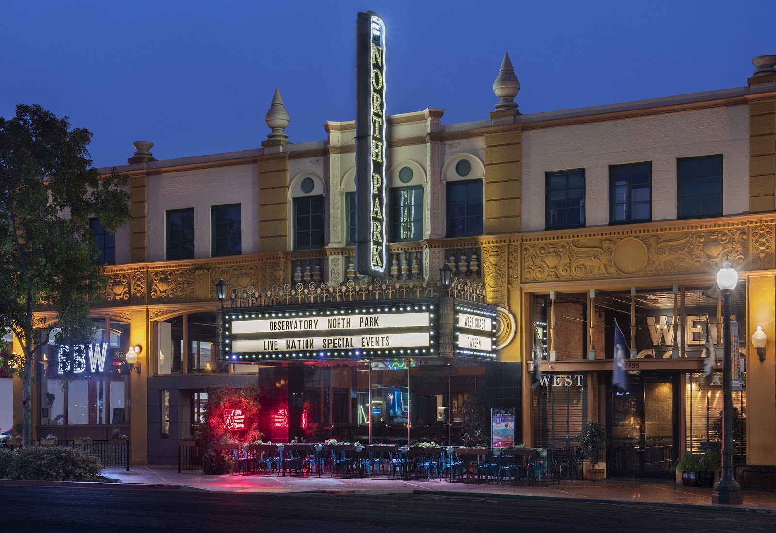 Live music crowd inside a restored theater in San Diego