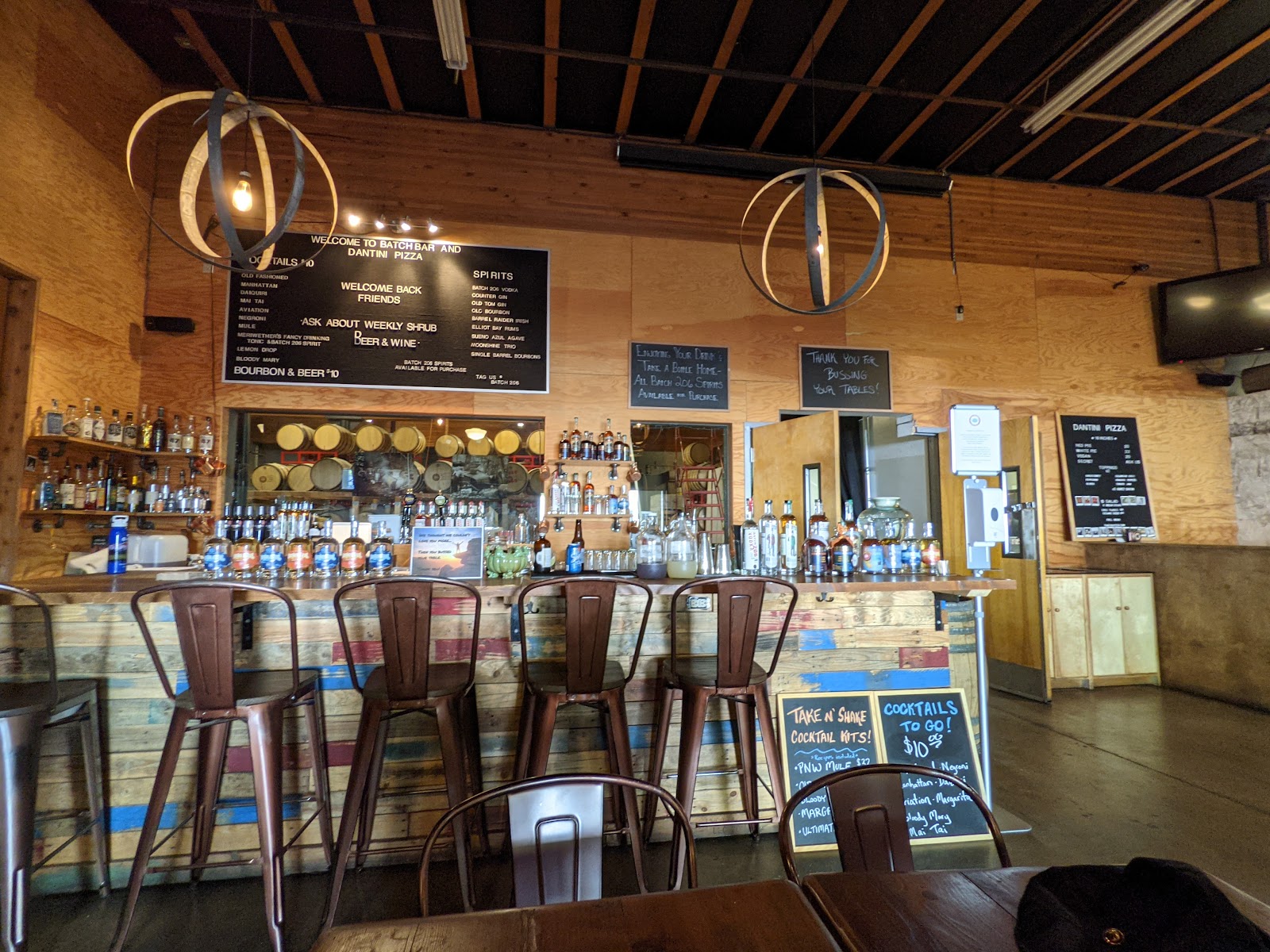 Craft distillery tasting room with copper still in Seattle's Interbay