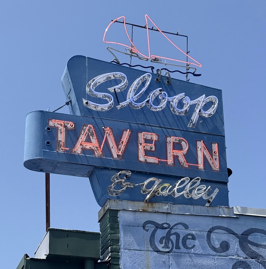 Bar stools and neon at The Sloop Tavern on NW Market Street
