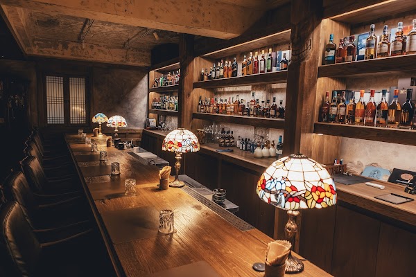 Warm cocktail bar with Korean traditional liquor bottles in Myeong-dong, Seoul