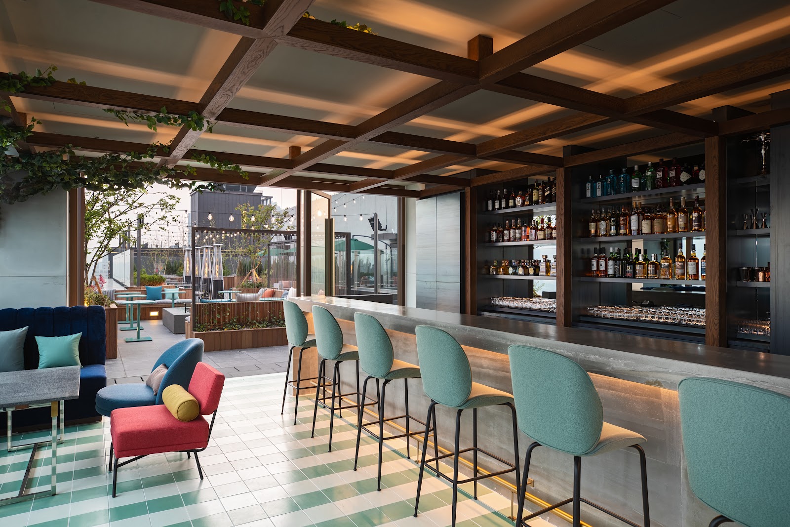 Rooftop bar terrace at night overlooking Seoul