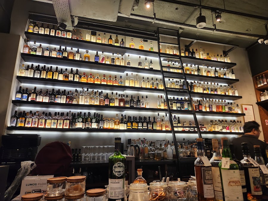 Shelves of rare spirits at La Maison du Whisky