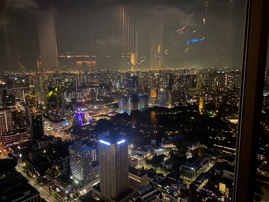 Singapore city lights at night from SKAI Bar
