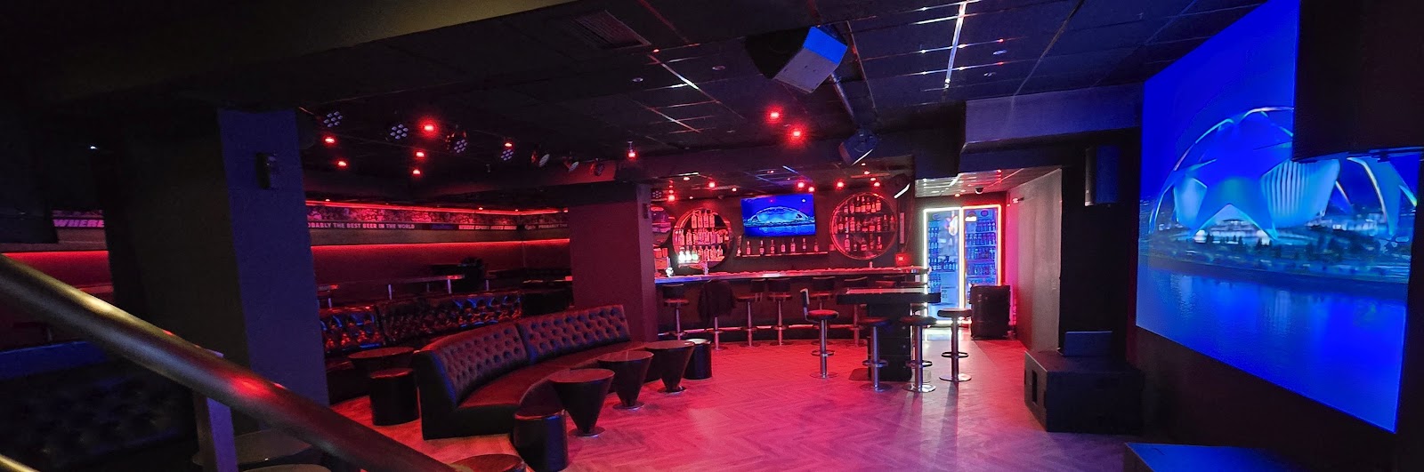 The Academy Sports Bar screens and tables in Sofia