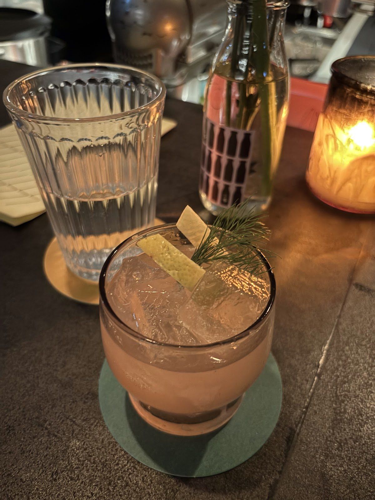 Craft cocktail with native Australian garnish at PS40