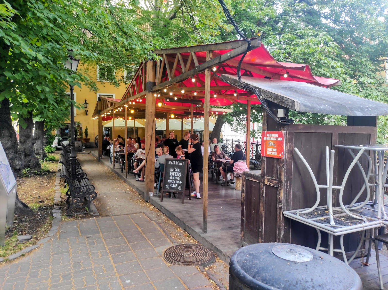 Old wooden pub interior with warm lamps