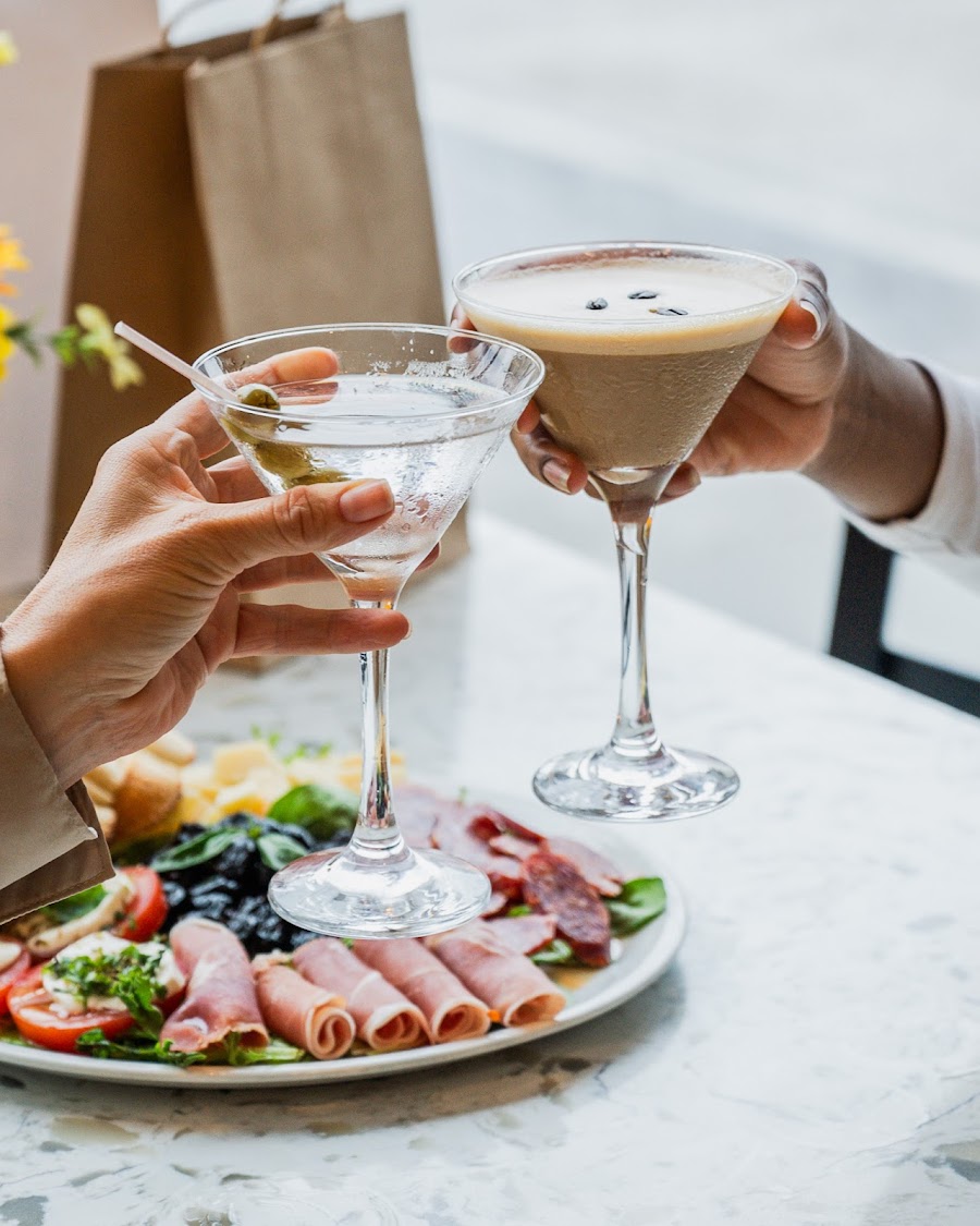Espresso and an Aperol spritz on a cafe table