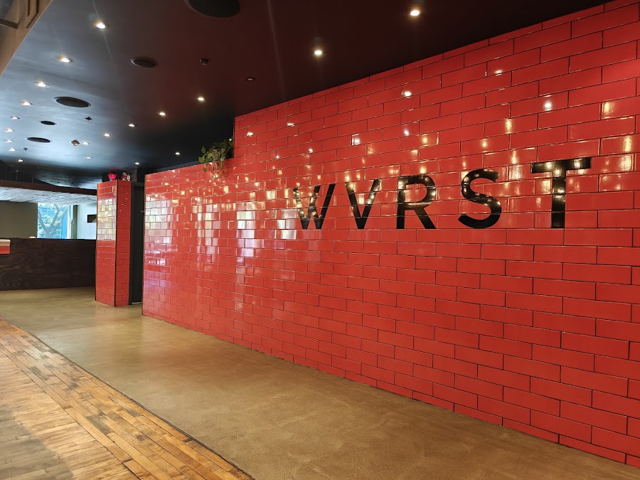 Grilled sausages and fries at WVRST in Toronto