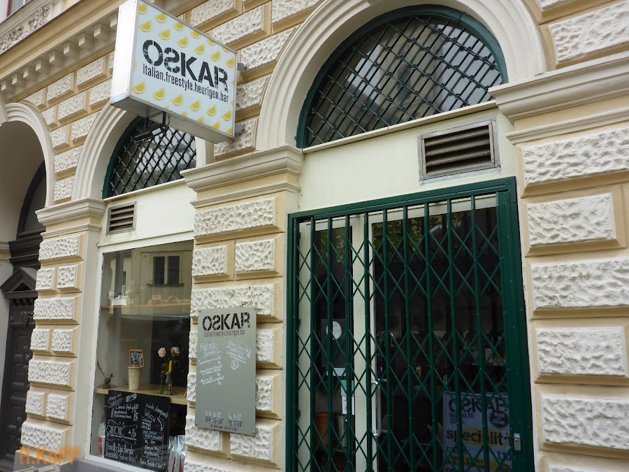The terrace and interior of Oskar bar on Gertrudplatz Vienna