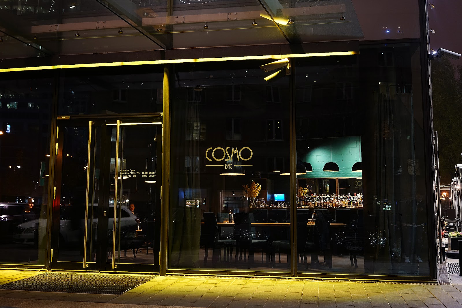 Bartender building a cocktail at COSMO Bar in the Cosmopolitan tower Warsaw