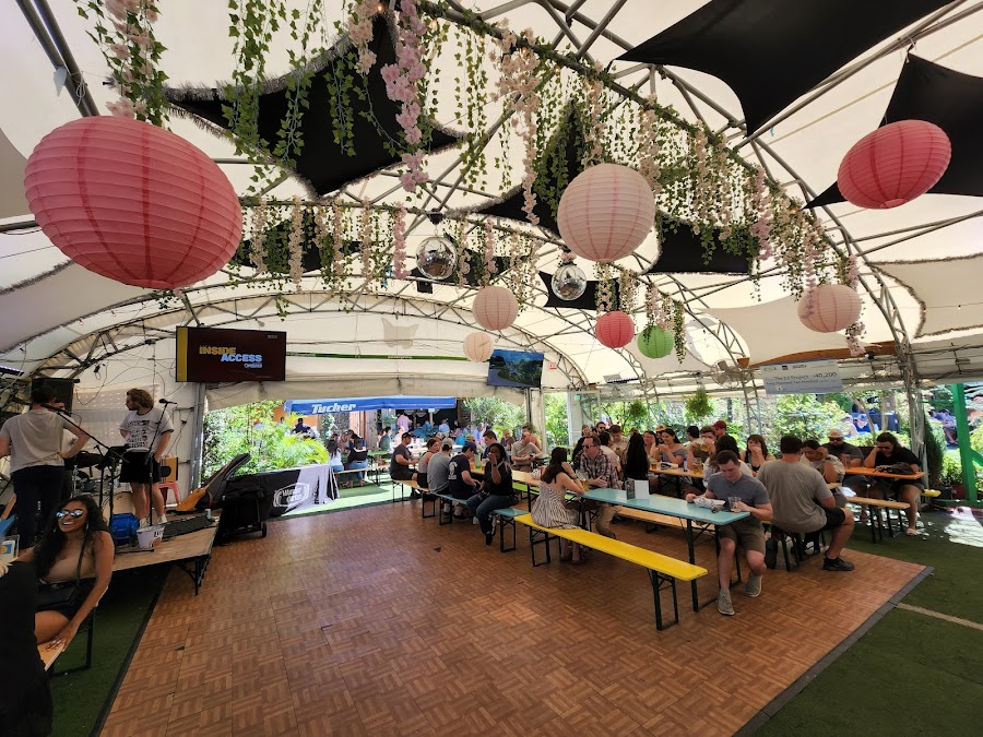 Outdoor tables and string lights at Wunder Garten in Washington DC
