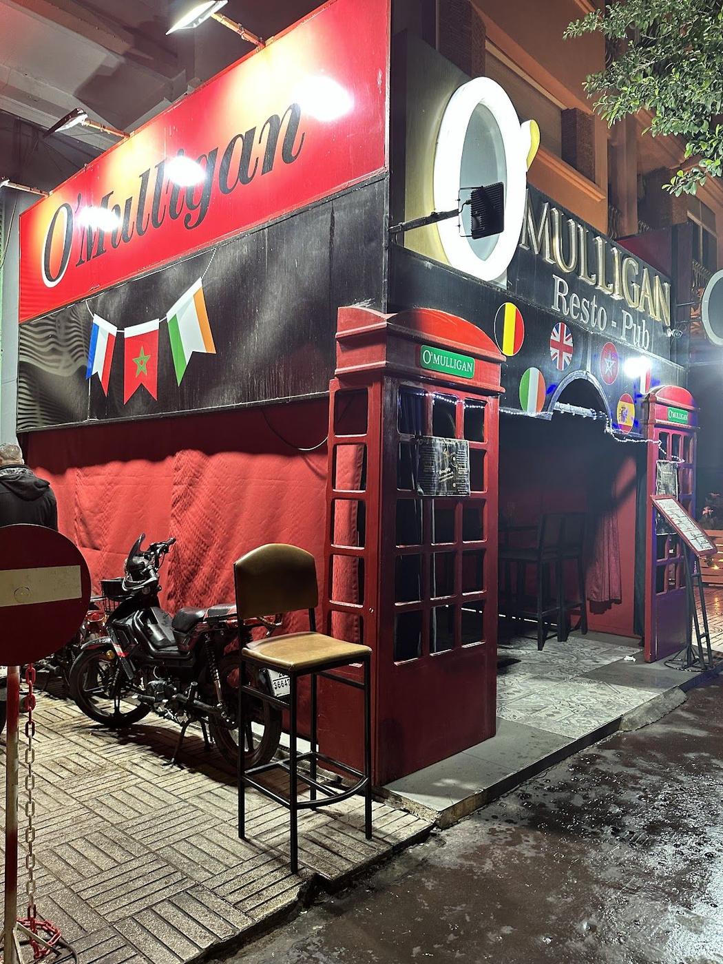 Sports bar screens at night in Marrakech